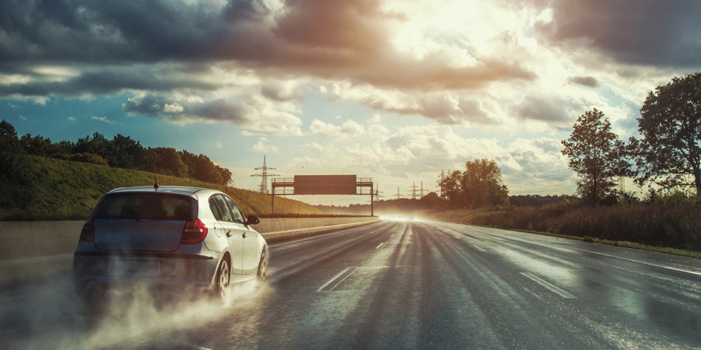 Braking and Vehicle Following Distance Analysis on Wet Surfaces